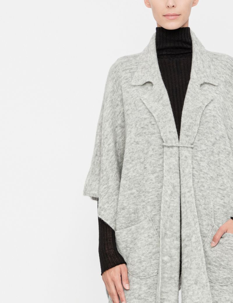 Sarah Pacini Poncho - col tailleur