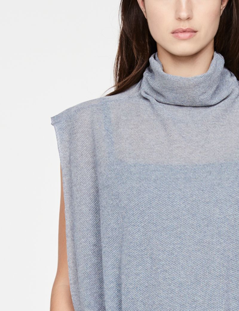Sarah Pacini lichte poncho - gaatjes