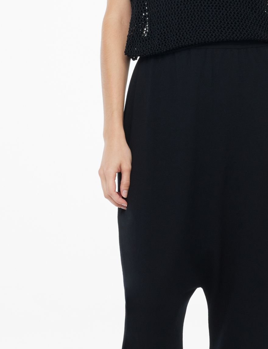 Black viscose sarouel pants by Sarah Pacini