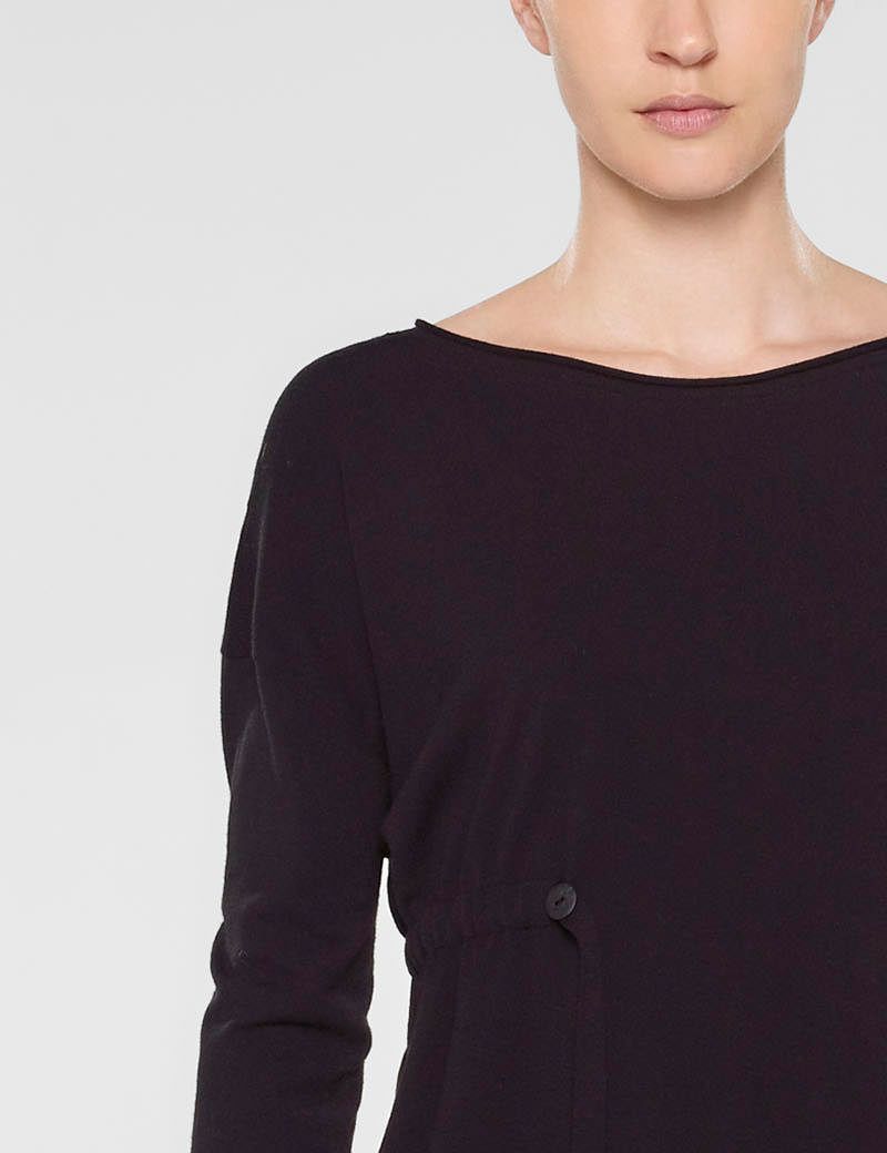 Black loose fit sweater, soft belt by Sarah Pacini