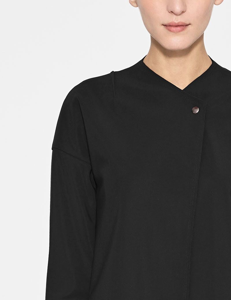 Black polyamide long jacket by Sarah Pacini