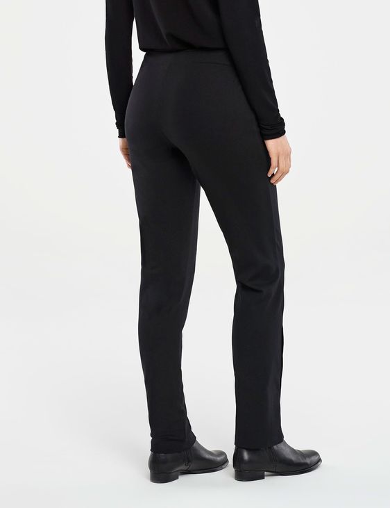 Black slim pants - snap button slit by 