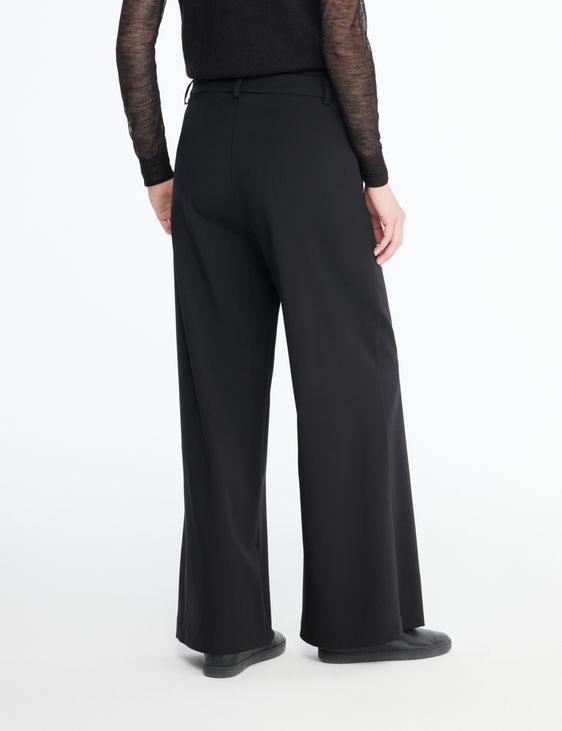 Black wool gabardine pants by Sarah Pacini