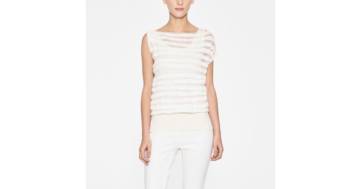 White linen translucent sweater by Sarah Pacini