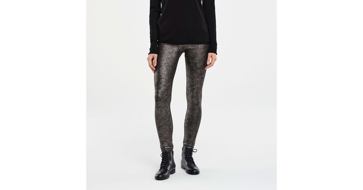 Black elastane shimmering leggings by Sarah Pacini