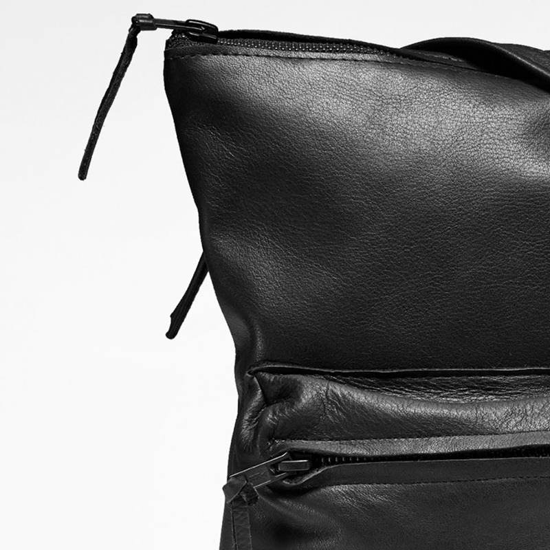 Black leather crossbody bag by Sarah Pacini