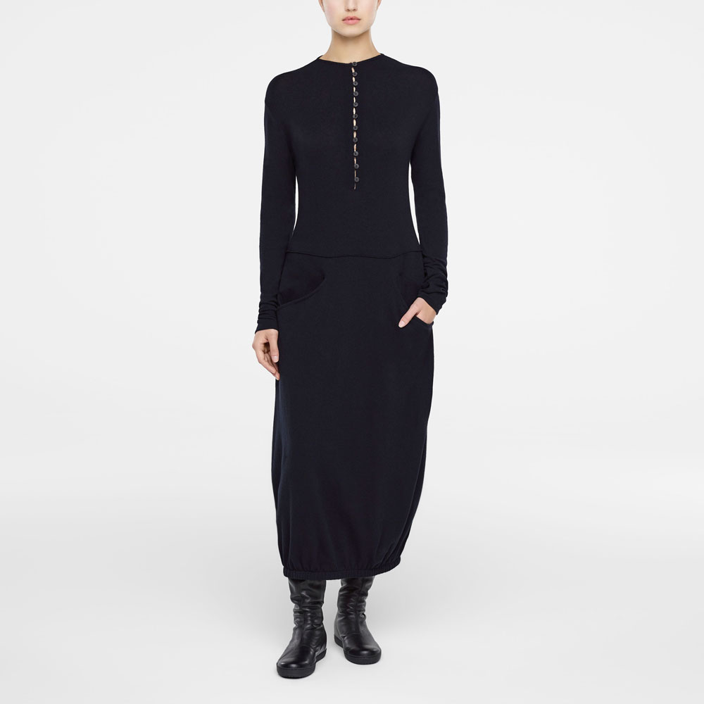 Black wool maxi-dress with open pockets by Sarah Pacini